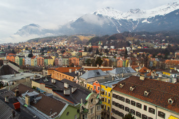 Fototapeta na wymiar Fairy town in the mountains.The city of Innsbruck in the mountains. The village in the Alps. View from above / top View. Alps, Innsbruck, Tyrol