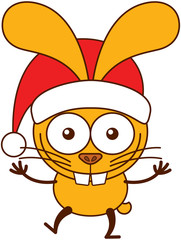 Cute yellow bunny with long ears, big teeth and wearing a Santa hat while wide opening its eyes, stretching its arms, smiling enthusiastically and greeting