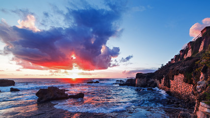 red sunset over Alghero