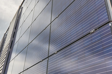 Photovoltaic displays on a wall