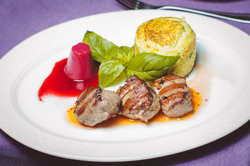The main dish in restarane. Grilled meat with sauce