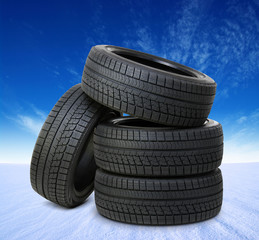 Obraz premium black tyres on snow