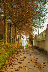 Fototapeta premium woman talking on phone with shopping bags