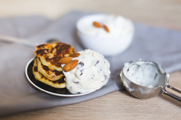 homemade ice cream with a spoon, and sweet cheese cake dessert