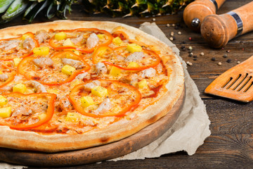 Delicious italian pizza served on wooden table
