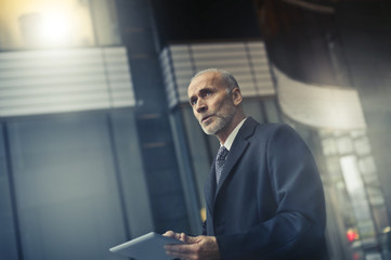 Fototapeta premium Worried businessman standing
