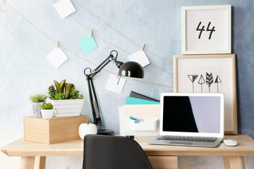 Comfortable workplace with laptop