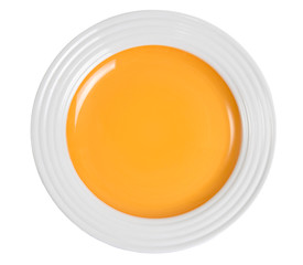 Yellow round plate isolated on white.