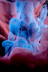 The colorful dye in the water. Abstract background. Wallpaper. Concept art
