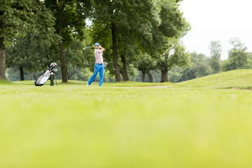 Golfer playing on beautiful golf course