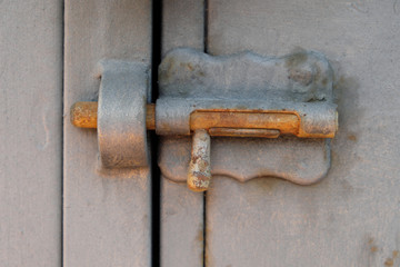 vintage metal latch, locking bolt, locked door
