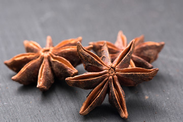 Star anise spice isolated on wooden table