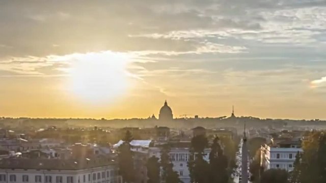 Sunset timelapse over Rome, Italy, from the Pincio garden park in Villa Borghese, with Vatican and St Peter's basilica in the distance. 
