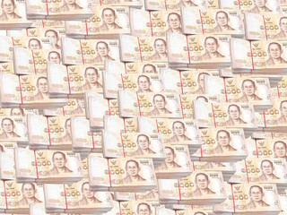 Stack of 1000 bath Thai money : New Thailand Currency 1000 Bath with the image of Thai King Bhumibol Adulyadej. - BankNotes background pattern.

