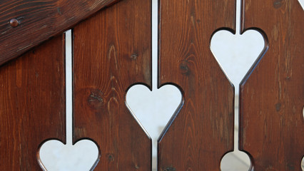 fence with heart-shaped hole in a mountain home