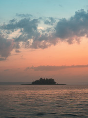 Obraz na płótnie Canvas lonely island at sunrise