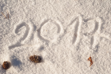 Fototapeta na wymiar 2017 new year's greetings, numbers, snow,