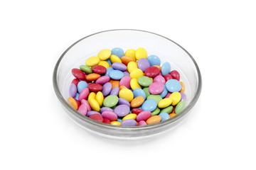 Bright colorful candy in glass bowl