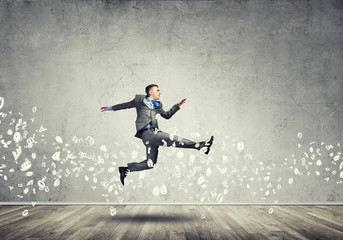 Businessman jumping high