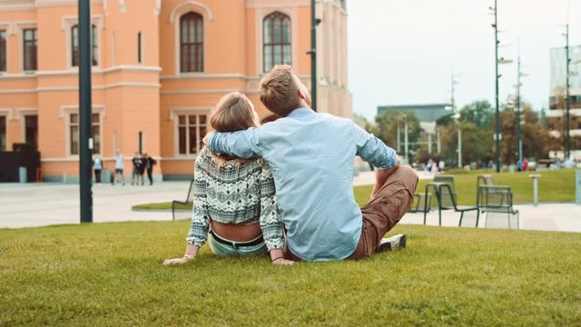 Young, cheerful couple relaxing in the summer day