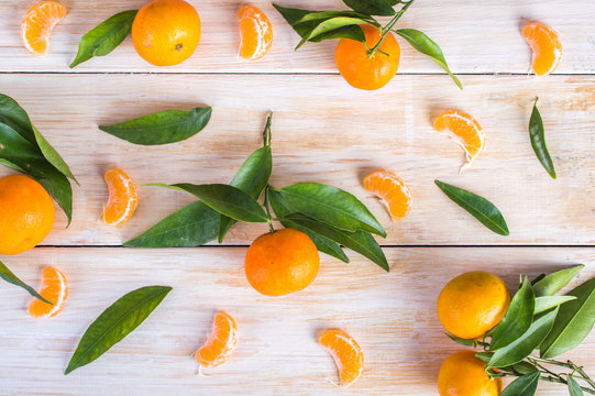 tangerines on a wooden background