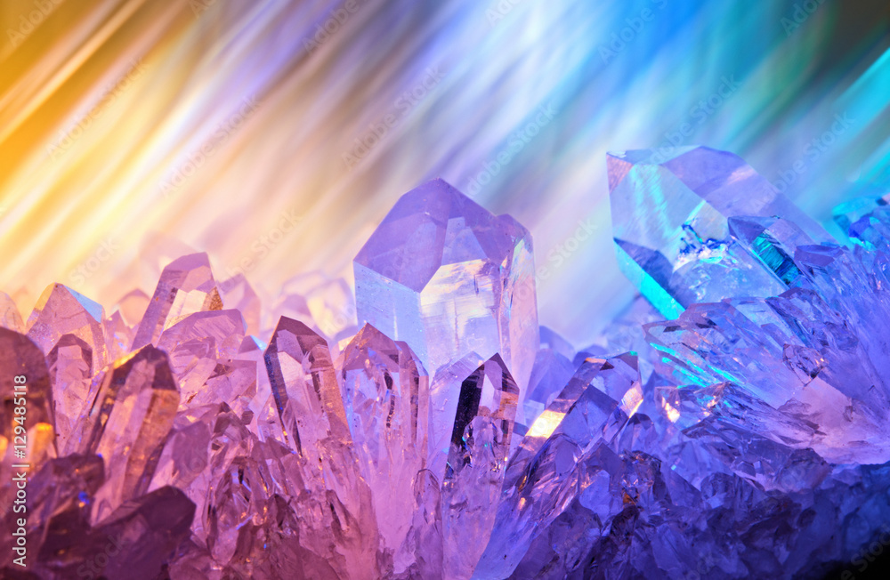 Wall mural sparkling multi-colored background with rays of light and cryst