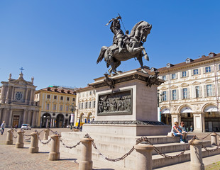 TURIN, ITALY - APRIL 19, 2016: Emanuele Filiberto equestrian statue and the two churches in San...
