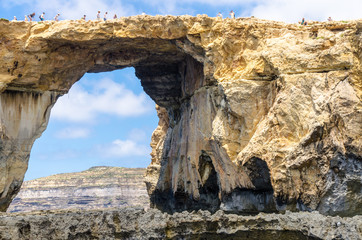 Tourists on the Azure Window in Gozo, Malta