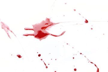 Several blood stains on white background
