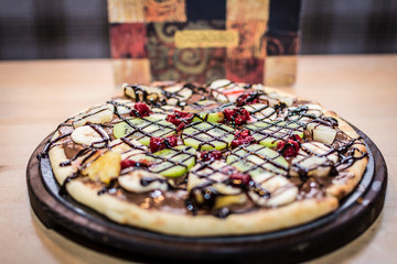 Pizza whit fruit and chocolate