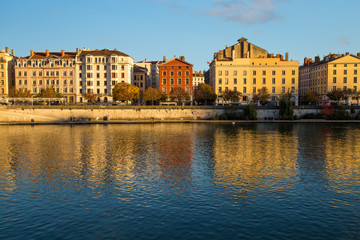Fototapeta na wymiar River side buildings in the sun in central Lyon