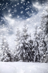 Naklejka premium Christmas background with snowy fir trees