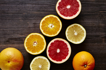 Fototapeta na wymiar variety of sliced organic citrus fruits