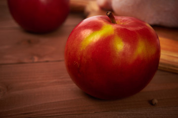 red apples on a wooden table