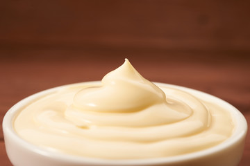 mayonnaise appetizing on wooden boards closeup