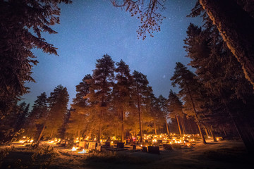 Cemetery with glowing candles 