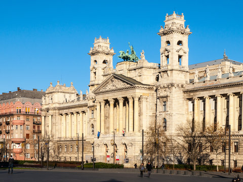 Hungarian National Museum of Ethnography, aka Neprajzi Muzeum, at Kossuth Lajos Square in Budapest, Hungary, Europe. View of entrance portal with two towers and architectural columns on sunny day with