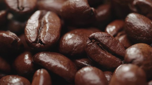 4K Aroma of coffee, strong Roast, Coffee Bean macro, static scene and rising up the smoke