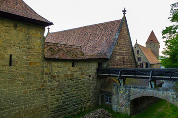 Fototapeta na wymiar MAULBRONN, GERMANY - MAI 17, 2015: row Tudor style houses at the monastery is part of the UNESCO World Heritage Site.
