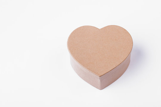 Heart shaped gift box isolated. Cardboard heart shaped gift box. Handmade present box. Present good emotions.