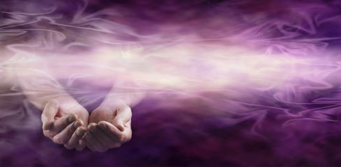 Offering healing energy banner  - pair of male hands gently cupped on left side with a stream of...