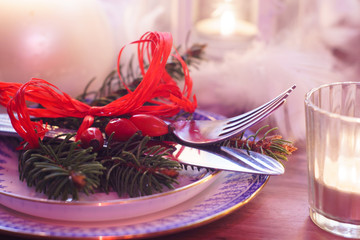 christmas table decorated for dinner