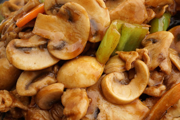 Chinese food. Pork with mushrooms and vegetables