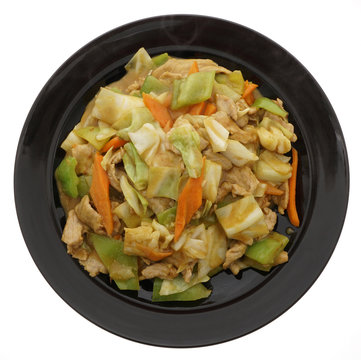 Chinese food. Pork with curry and vegetables