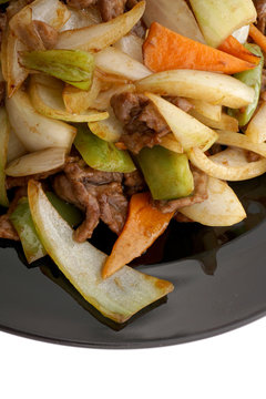 Chinese food. Veal with onions and vegetables