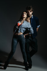 Young couple in unbutton shirts