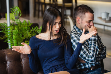 Man and woman in discussions in the restaurant