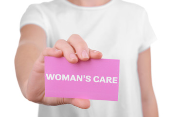 Medical service concept. Woman holding visiting card, closeup