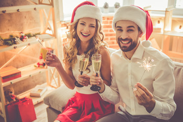 Beautiful couple celebrating Christmas