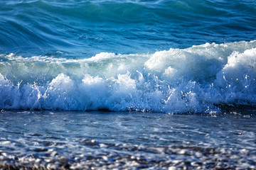 sea pebble on beach and  waves - nature background